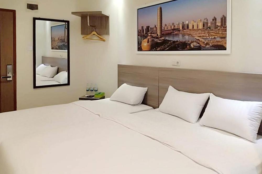 Twospaces Living At Maximus Inn Palembang Bagian luar foto