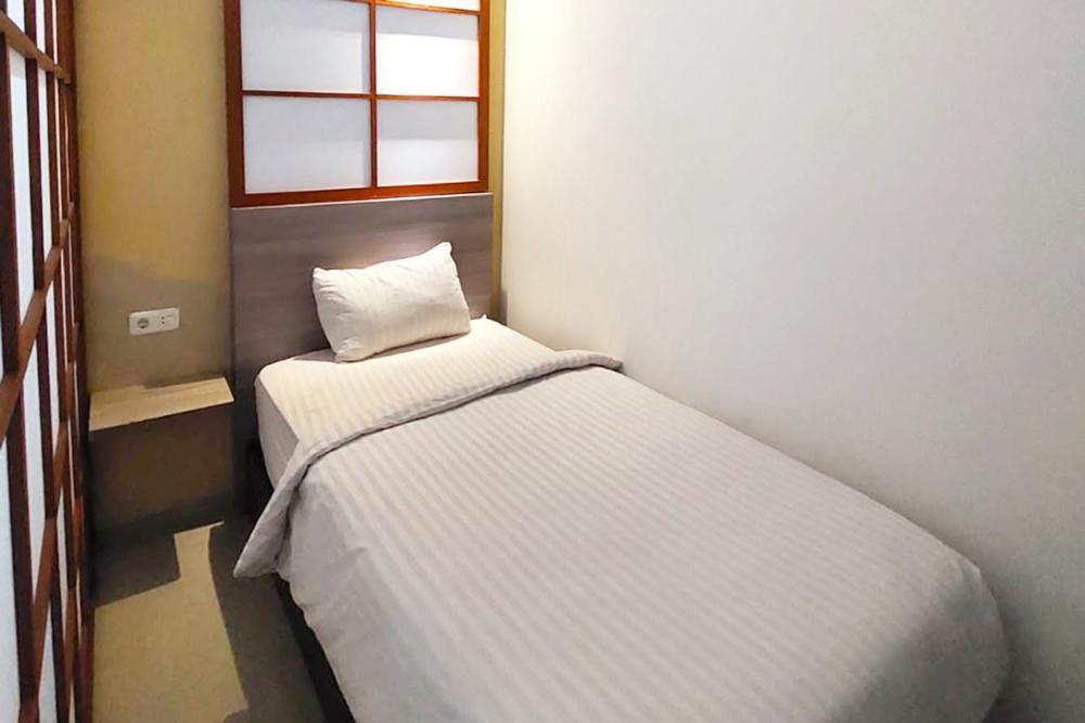 Twospaces Living At Maximus Inn Palembang Bagian luar foto